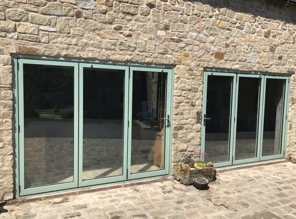 Green Bi-folding Doors