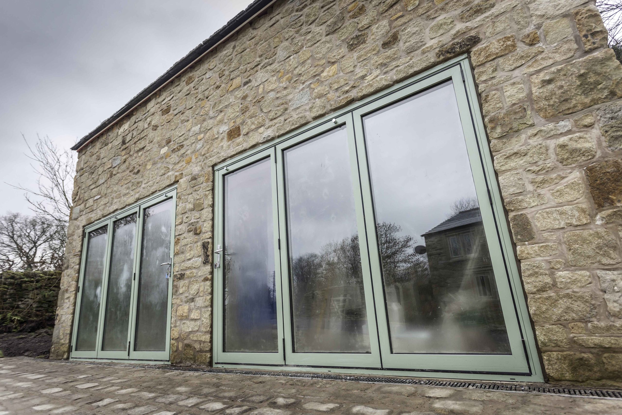 aluminium bi-folding doors outdoor view